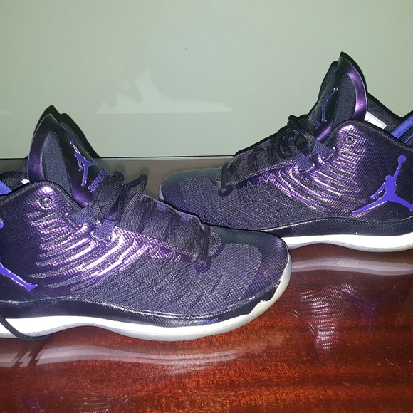 shiny purple nike shoes